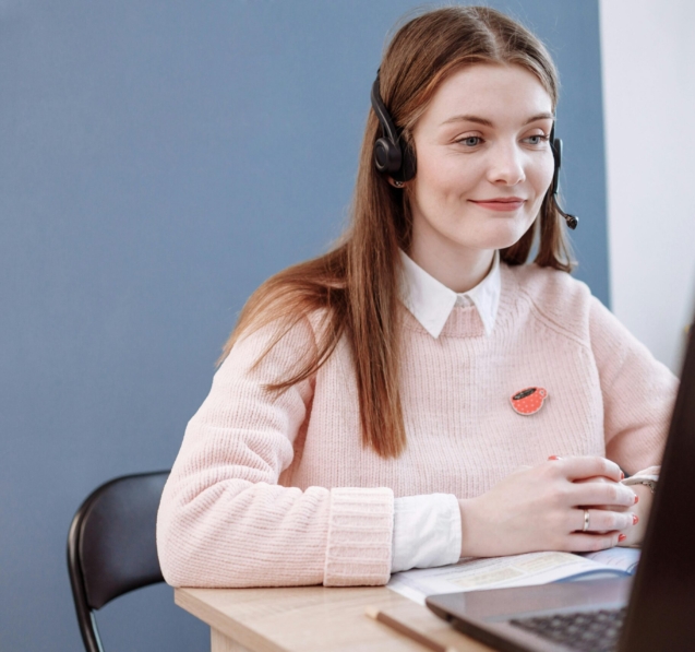 Woman working on laptop in office